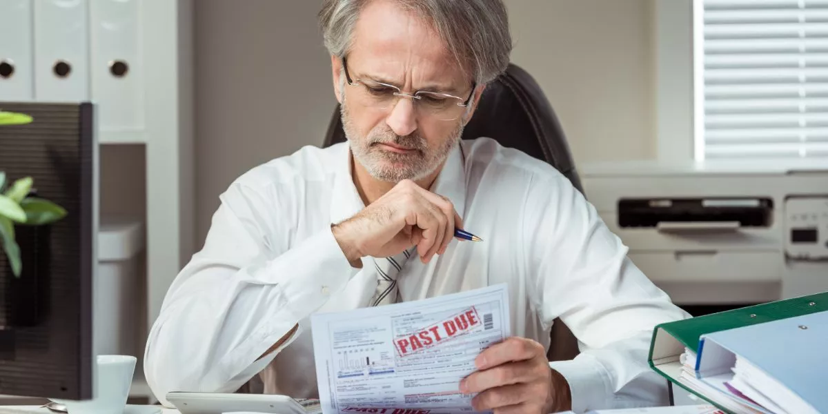 man reading a document - Texas Bankruptcy Exemptions