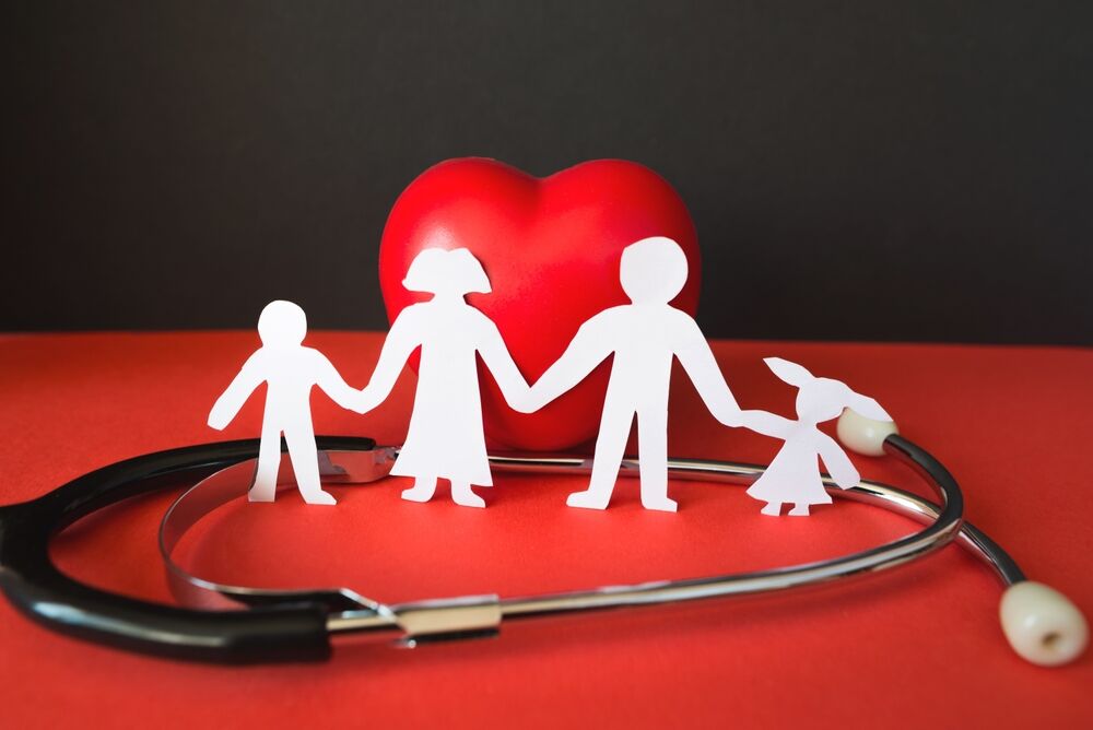Family paper cut with red heart and stethoscope, heart health, family health insurance concept, Red Cross CPR, World Heart Day, World Health Day, life insurance