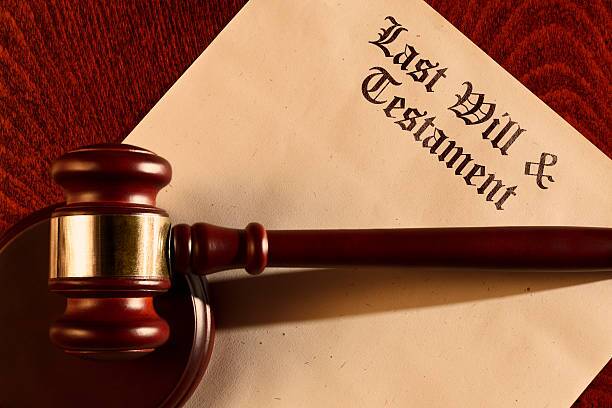 Last Will & Testament Last Will & Testament with the gavel and the sounding block. will and trust brown stock pictures, Does a Will Have to Be Signed by Other Parties in Texas?