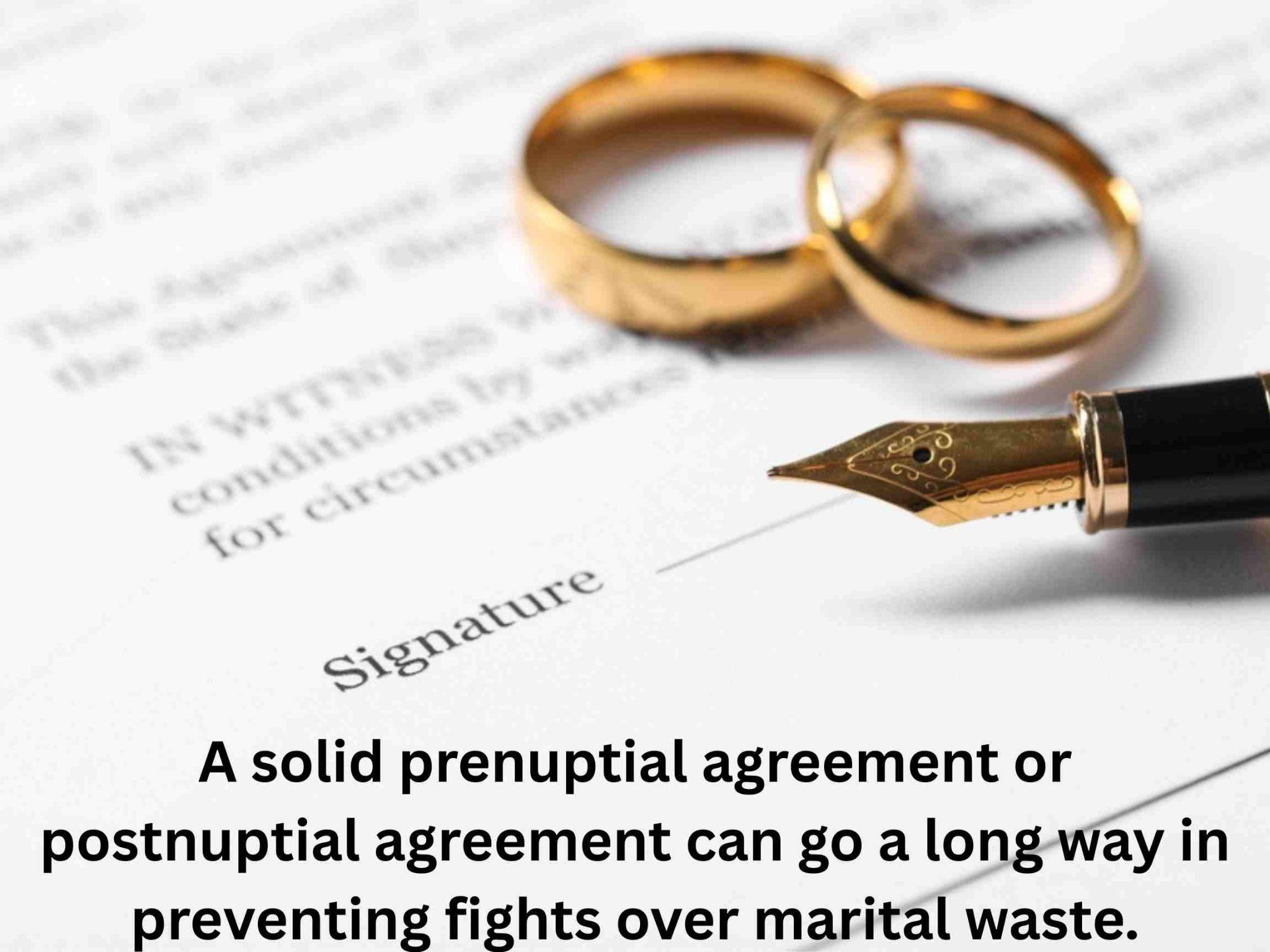 Two wedding rings and a fountain pen rest on a prenuptial agreement document, highlighting the importance of legal agreements in marriage and their impact on issues like divorce settlement.