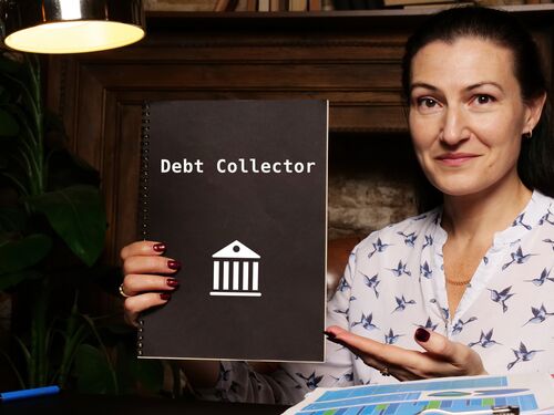 Juridical concept meaning Debt Collector with phrase on the sheet.